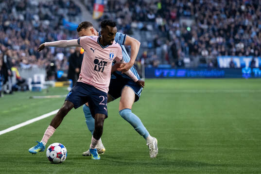 Malmö FFs Taha Ali och Djurgårdens Piotr Johansson