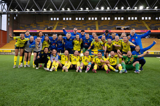 Players of Sweden celebrate