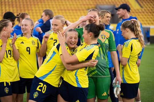 Fanny Peterson and Thea Staffansson of Sweden celebrate