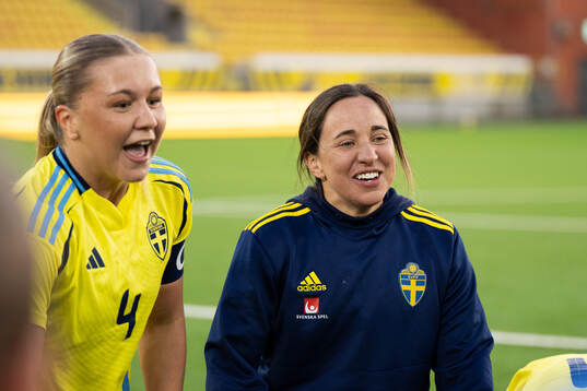 Coach Briana Campos of Sweden celebrates