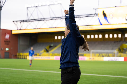 Coach Briana Campos  of Sweden celebrate