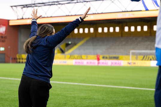 Coach Briana Campos of Sweden celebrate