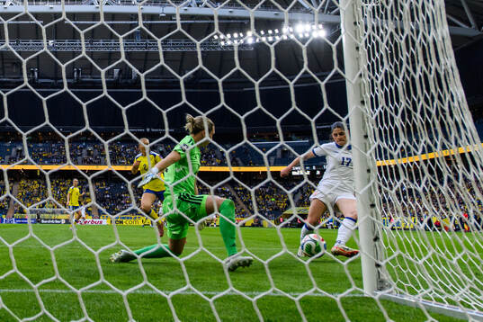 goalkeeper Jennifer Falk of Sweden and Sara Stokic of Serbia