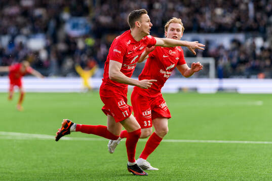 Joachim Soltvedt of Brann celebrates with teammate Markus