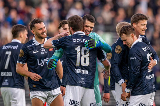 Goalkeeper Lubomir Belko and players of Viking