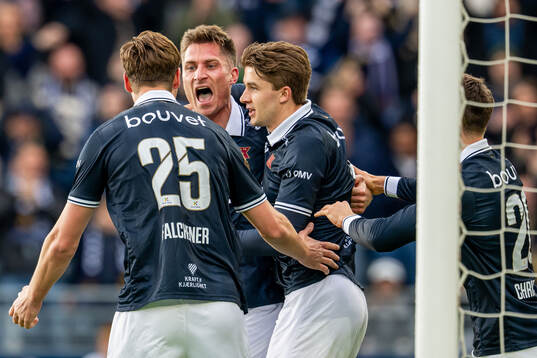 Kristoffer Haugen of Viking celebrates with Henrik Heggheim