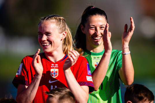 Julie Blakstad and goalkeeper Cecilie Fiskerstrand of Norway