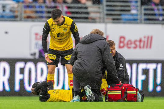 Eric Kitolano of Lillestrøm with an injury