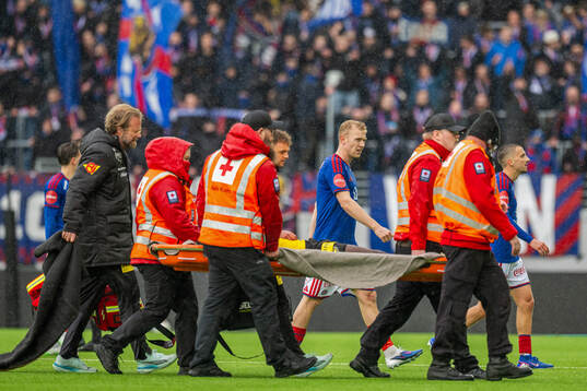 Eric Kitolano of Lillestrøm with an injury
