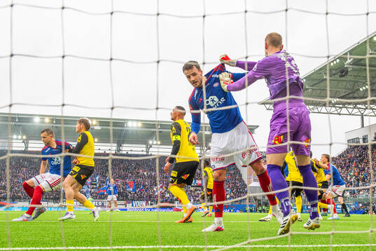 Magnus Westergaard of Vålerenga and goalkeeper Pontus