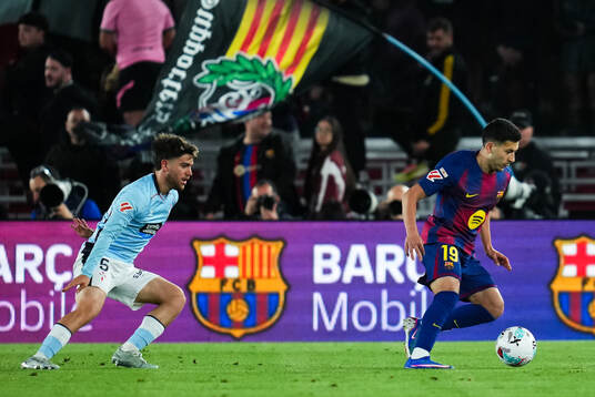 Sergio Carreira of Celta Vigo and Roony Bardghji of