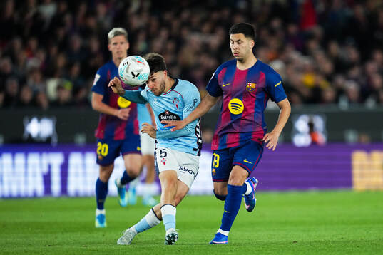Sergio Carreira of Celta Vigo and Roony Bardghji of