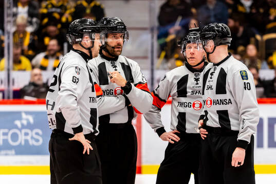 Huvuddomare Mikael Sjöqvist och Mikael Holm