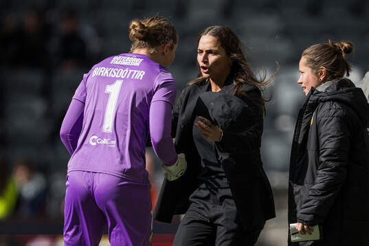 Goalkeeper Fanney Birkisdottir and coach Elena Sadiku of