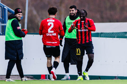 Nordic United FCs Kalipha Jawla jublar