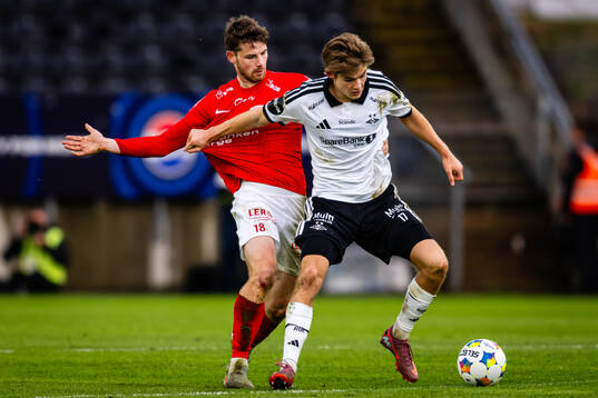 Jacob Sørensen of Brann and Mads Bomholt of Rosenborg