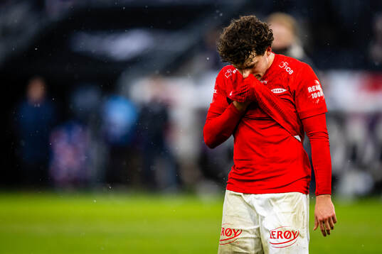 Denzel De Roeve of Brann looks dejected
