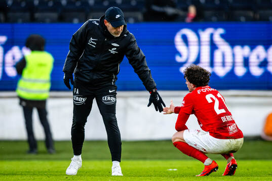 Head coach Freyr Alexandersson and Denzel De Roeve of Brann