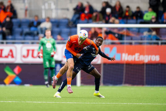 Emil Engqvist of Aalesund and Mustapha Isah of Kristiansund