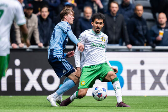 Djurgårdens Max Larsson och Hammarbys Montader Madjed