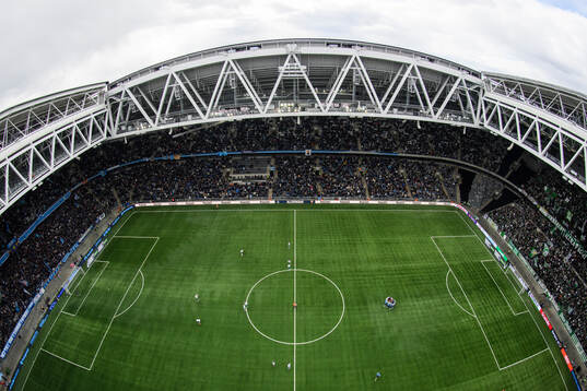 Djurgårdens spelare samlas i en ring