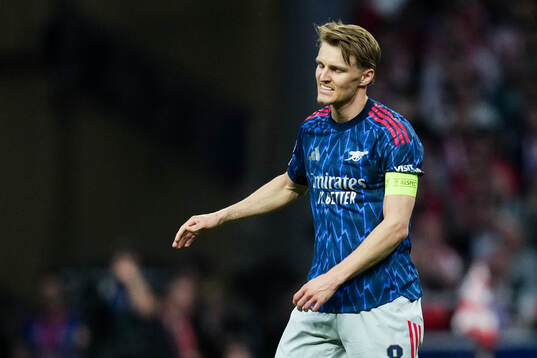 Martin Ødegaard of Arsenal looks dejected