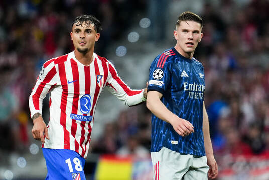 Marc Pubill of Atletico Madrid and Viktor Gyökeres of
