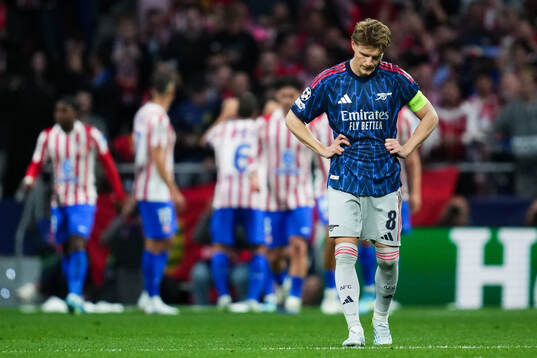 Martin Ødegaard of Arsenal looks dejected