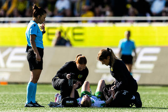Emilie Joramo of Hammarby receives medical attention