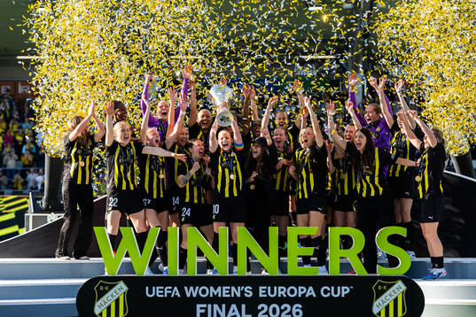 Anna Anvegård of Häcken raises the trophy as she