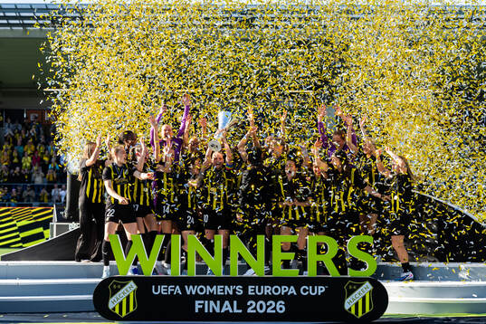 Anna Anvegård of Häcken raises the trophy as she