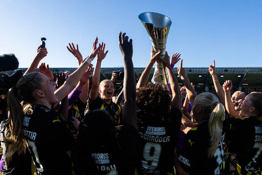 Players of Häcken celebrate with the trophy