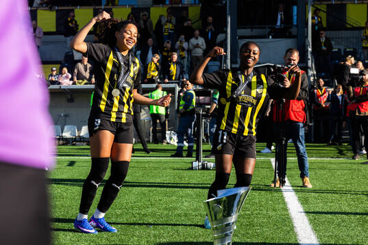 Felicia Schröder and Monica Jusu Bah celebrate