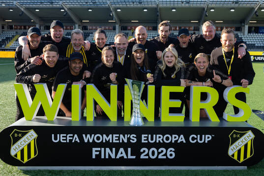 The staff of Häcken celebrate with the trophy