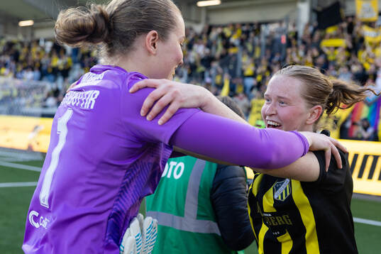 Goalkeeper Fanney Inga Birkisdottir and Emma Östlund of