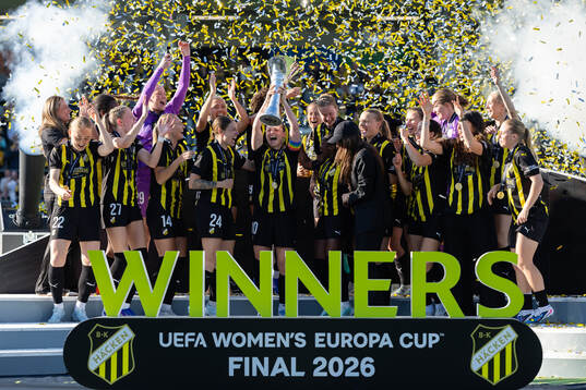 Players of Häcken celebrate with the trophy