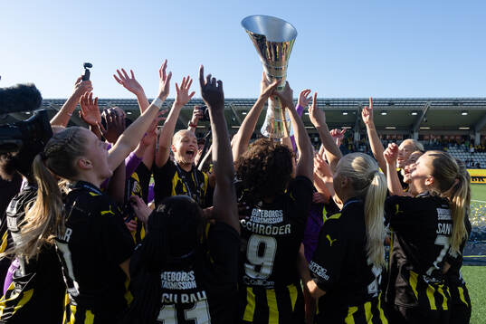 Players of Häcken celebrate with the trophy