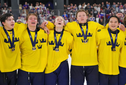 In this handout picture from IIHF Team Sweden players