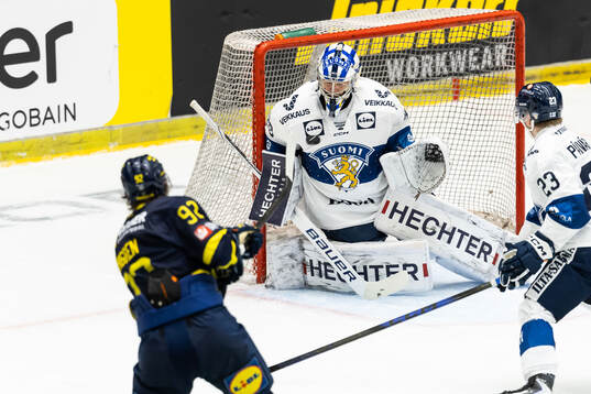 Liam Öhgren of Sweden and goaltender Harri Säteri of