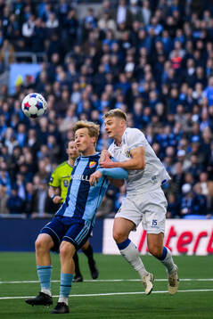 Djurgårdens Bo Hegland och IFK Göteborgs David Kruse