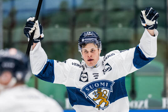 Jesse Puljujärvi of Finland celebrates