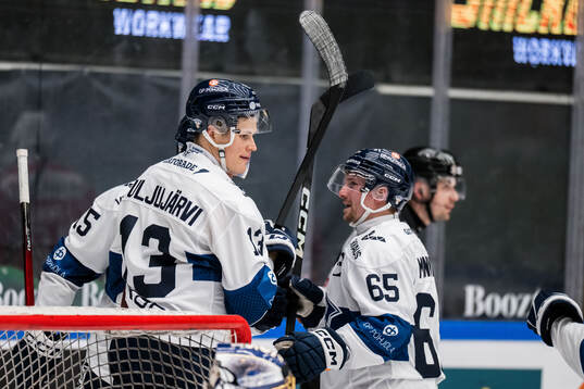 Jesse Puljujärvi and Sakari Manninen of Finland celebrates