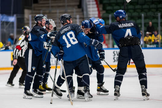 Esa Tikkanen of Finland Legends celebrates