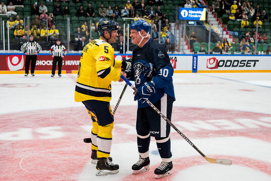 Nicklas Lidström of Sweden Legends and Esa Tikkanen of