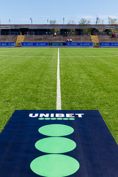 En matta med Unibets logotyp