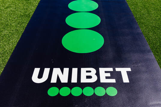 En matta med Unibets logotyp