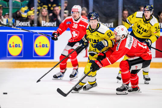 Emil Heineman of Sweden and Nico Hischier of Switzerland