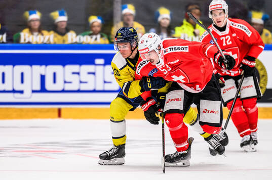 André Petersson of Sweden and Yannick Frehner of