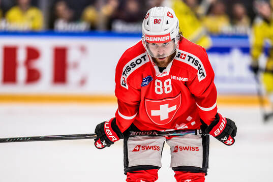 Simon Knak of Switzerland looks dejected