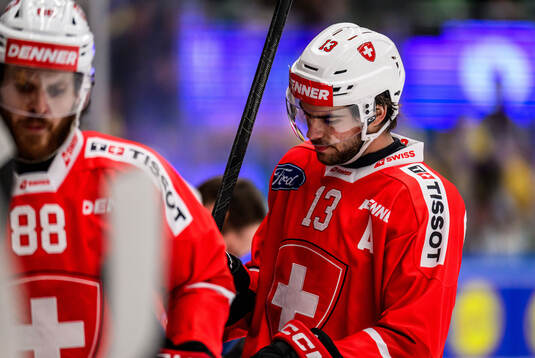 Nico Hischier of Switzerland looks dejected